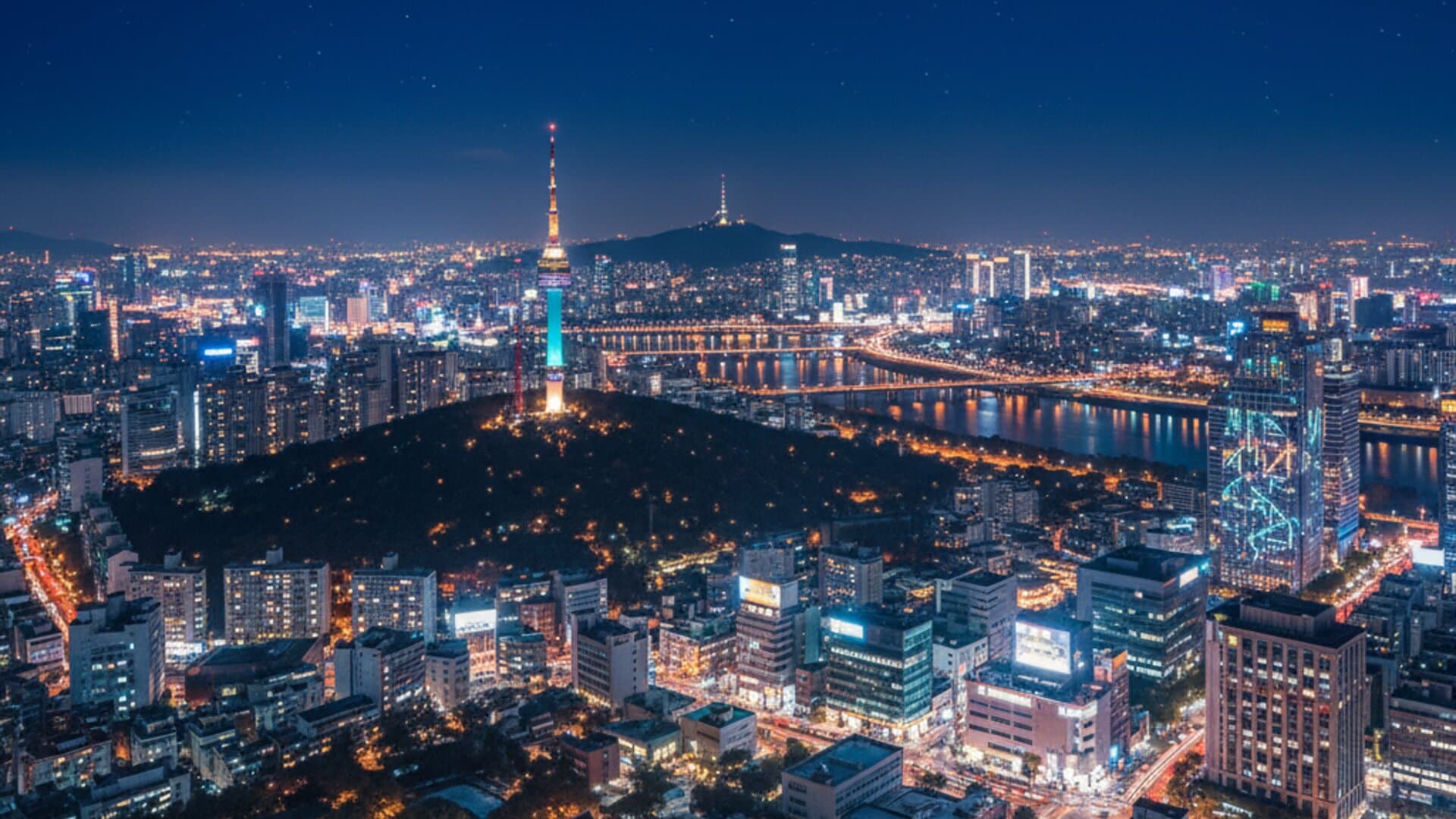 Seoul at night with illuminated tower and city lights